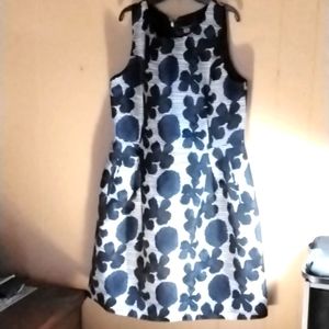 A blue/off white dress w/flower design